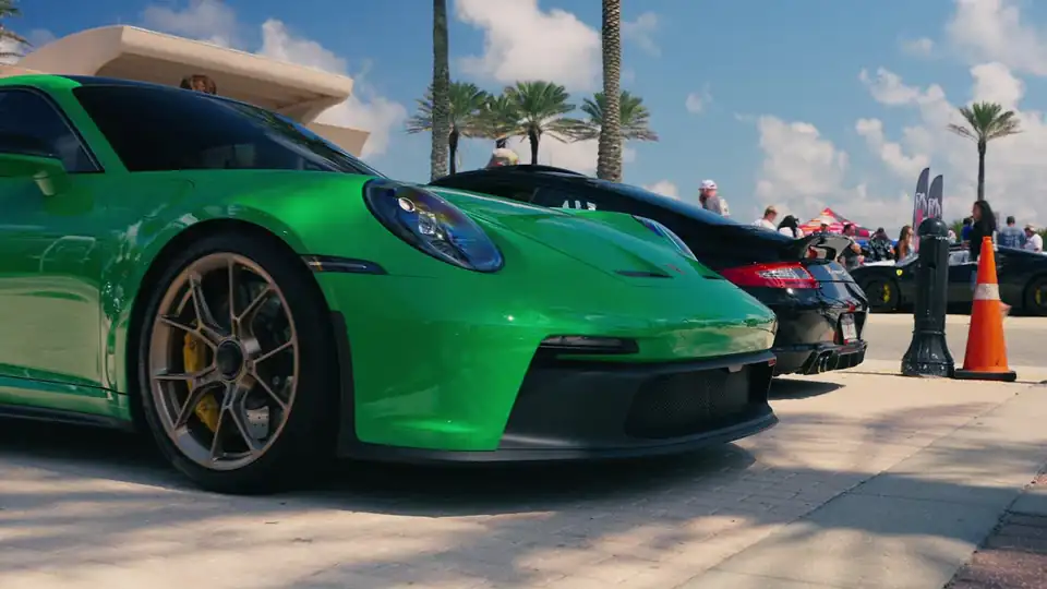 Green Porsche 911 GT3 on the show field