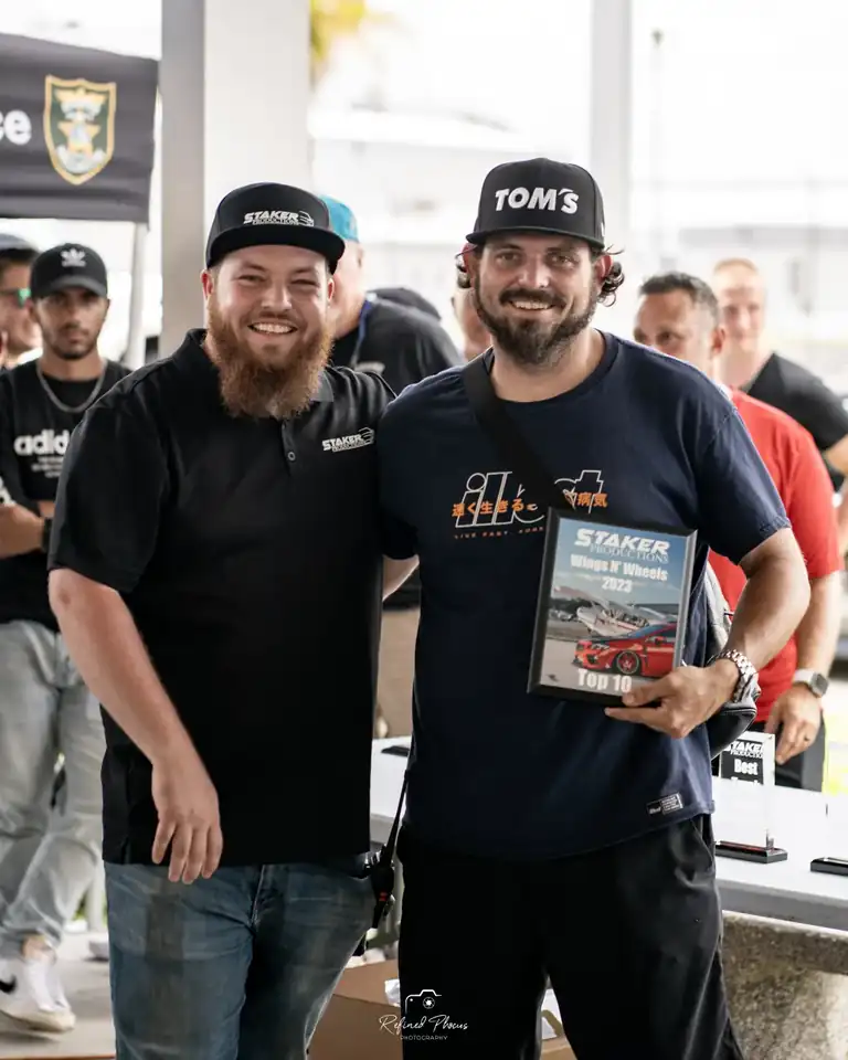 An award presentation at the first Wings N' Wheels